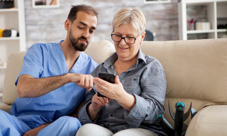 Patient using a mobile device with caregiver support for electronic clinical outcome assessment in a clinical trial