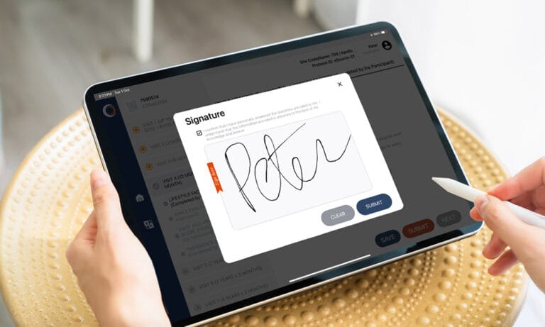 Participant signing an electronic consent form on a tablet using an eConsent platform for clinical trial consent documentation.